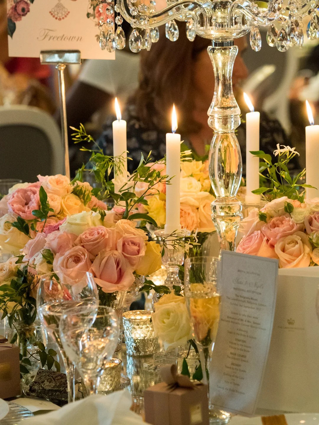 Candlelight, peach garden roses, nothing more.