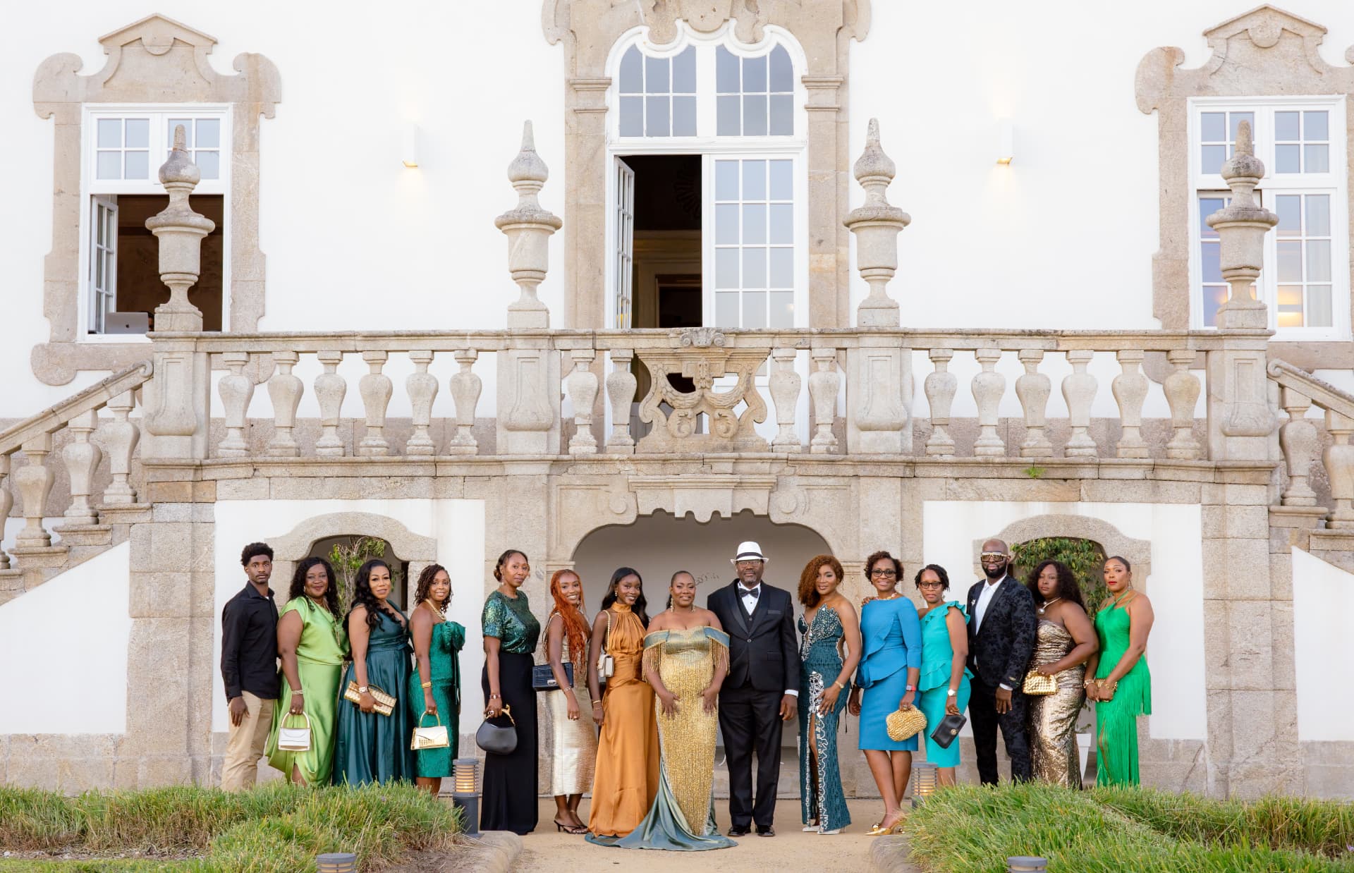 Guests gathered in full evening dress before the baroque facade of Palácio do Freixo