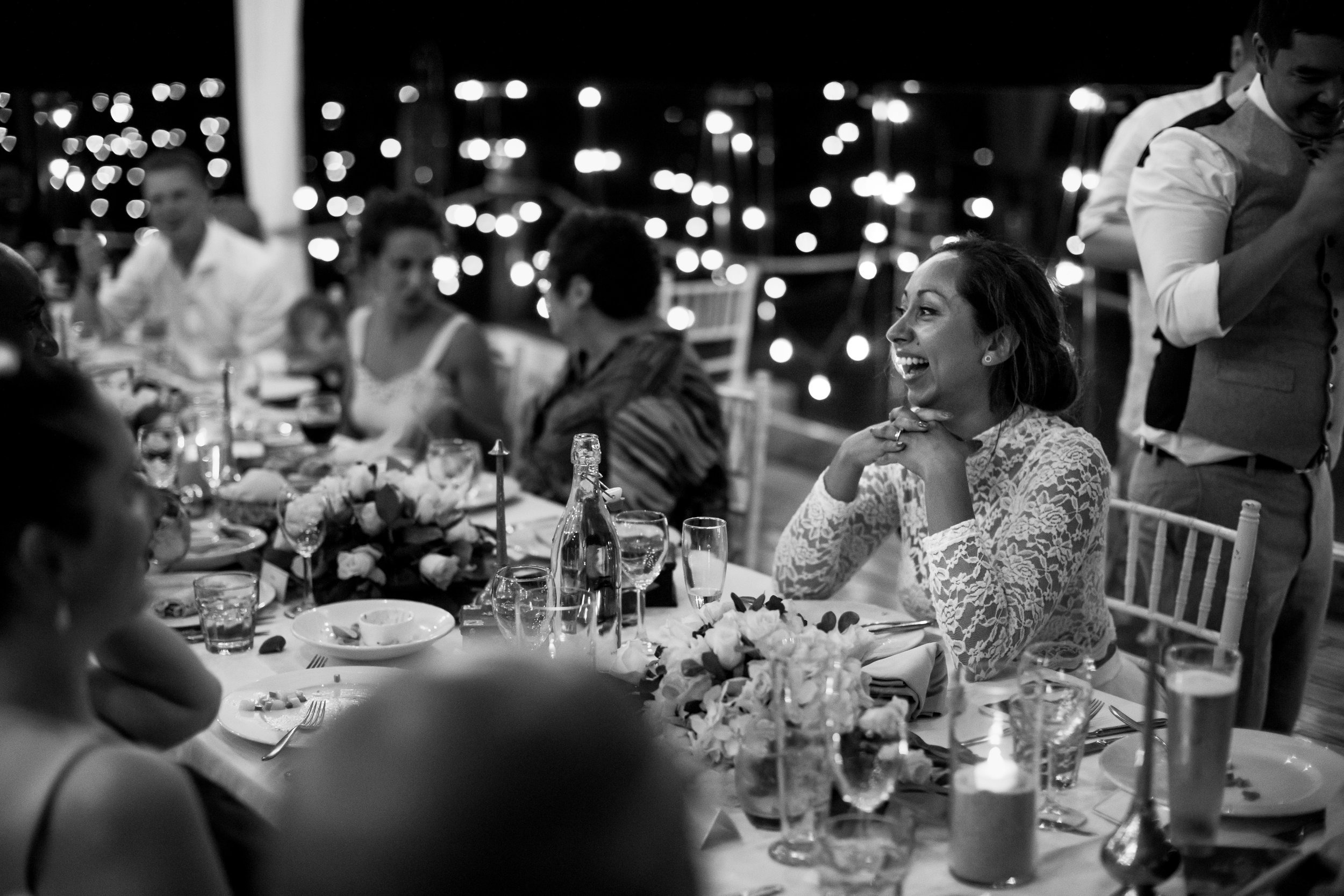 Guests dining by lantern light in Zanzibar